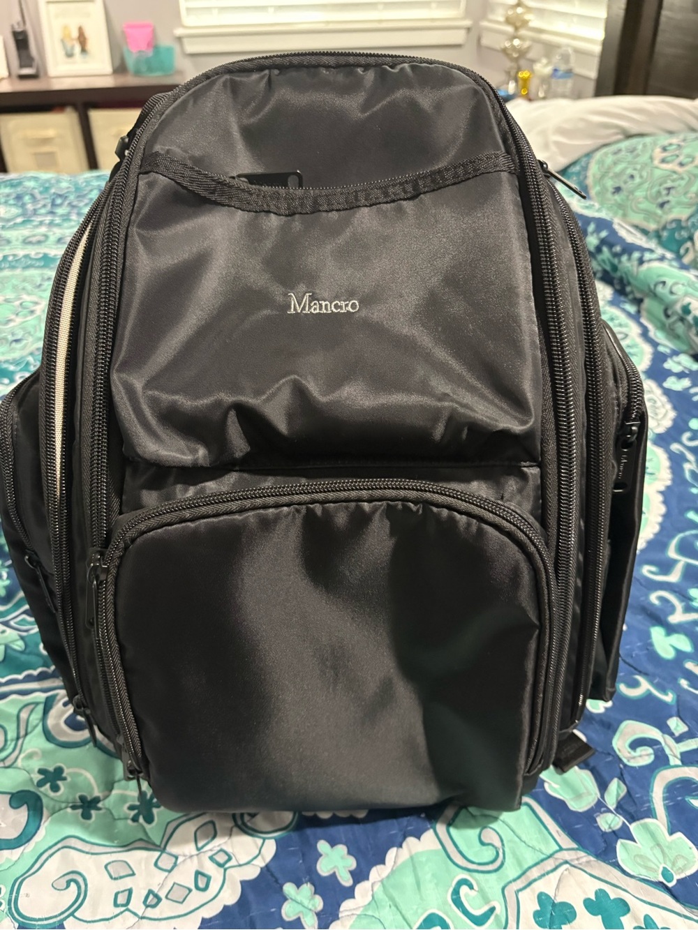 Like new, Mancro large baby backpack diaper bag with cooler pouch & changing pad